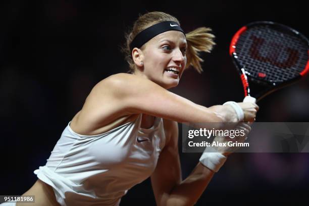 Petra Kvitova of Czech Republic plays a backhand to Angelique Kerber of Germany during day 3 of the Porsche Tennis Grand Prix at Porsche-Arena on...