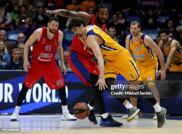 Alexey Shved, #1 of Khimki Moscow Region competes with Victor Rudd, #3 of CSKA Moscow in action during the Turkish Airlines Euroleague Play Offs Game...