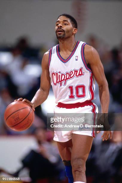 Norm Nixon of the LA Clippers handles the ball during a game circa 1988 at the Los Angeles Memorial Sports Arena in Los Angeles, California. NOTE TO...