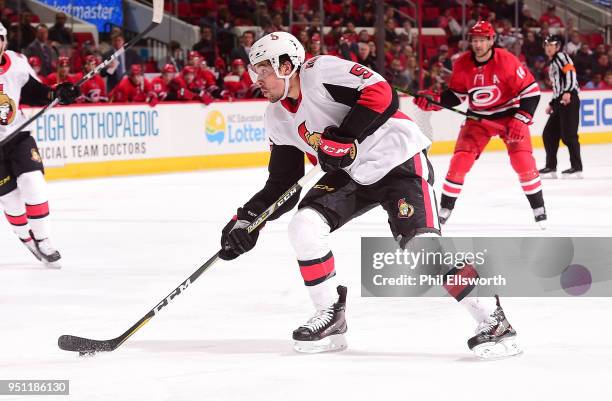 Cody Ceci of the Ottawa Senators looks to shoot the puck during an NHL game on March 26, 2016 at PNC Arena in Raleigh, North Carolina.