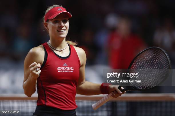 Angelique Kerber of Germany celebrates after defeating Petra Kvitova of Czech Republic during day 3 of the Porsche Tennis Grand Prix at Porsche-Arena...