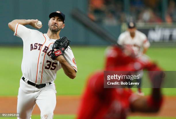 Justin Verlander of the Houston Astros pitches in the first inning against the Los Angeles Angels of Anaheim at Minute Maid Park on April 25, 2018 in...