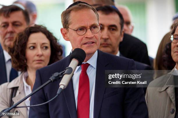 Berlin's Mayor Michael Mueller, speaks at a "wear a kippah" gathering to protest against anti-Semitism in front of the Jewish Community House on...