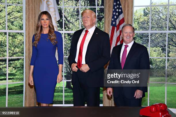 Sean Spicer reveals the first Madame Tussauds Melania Trump figure at the launch of the "Give Melania A Voice" Experience at Madame Tussauds on April...
