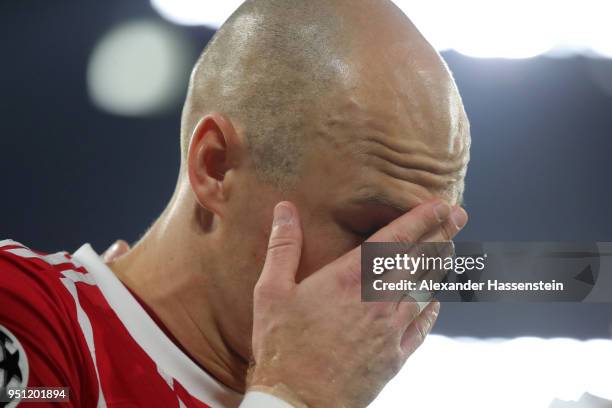 Arjen Robben of Bayern Muenchen leaves the pitch in pain following an injury during the UEFA Champions League Semi Final First Leg match between...