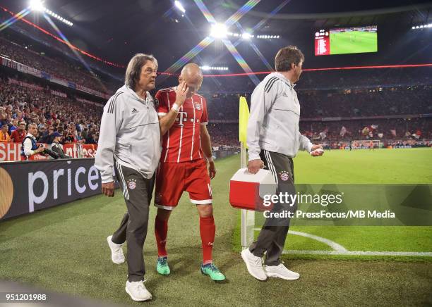 Arjen Robben of Bayern Muenchen walks off the pitch with an injury during the UEFA Champions League Semi Final First Leg match between Bayern...