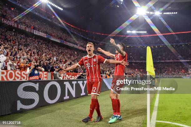 Joshua Kimmich of Bayern Muenchen celebrates with team-mate James Rodriguez after scoring the opening goal during the UEFA Champions League Semi...