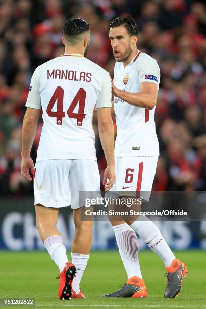 Kevin Strootman of Roma speaks to teammate Konstantinos Manolas of Roma during the UEFA Champions League Semi Final First Leg match between Liverpool...
