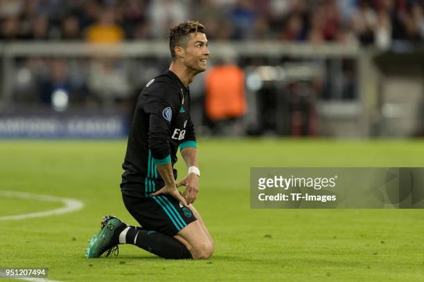 Cristiano Ronaldo of Real Madrid on the ground during the UEFA Champions League Semi Final First Leg match between Bayern Muenchen and Real Madrid at...