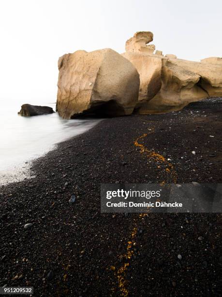 volcanic beach in "tajao" town, in south of tenerife island (canary islands) - dähncke stock pictures, royalty-free photos & images