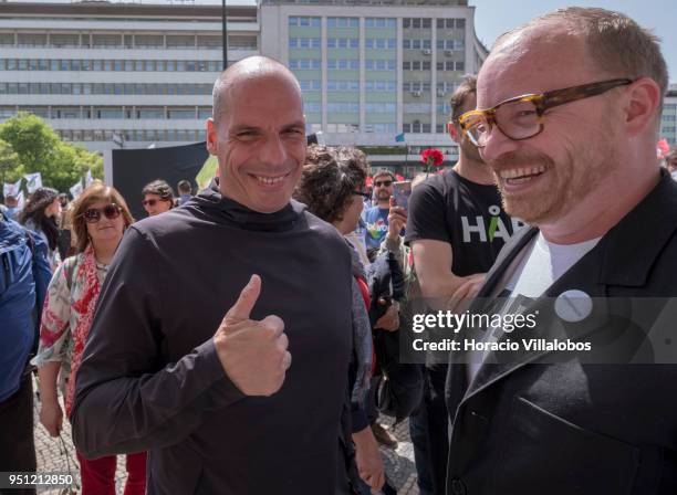 Former Greek Finance Minister and co-founder of DiEM25 Yanis Varoufakis gives a thumbs-up sign while waiting to walk through Avenida da Liberdade...