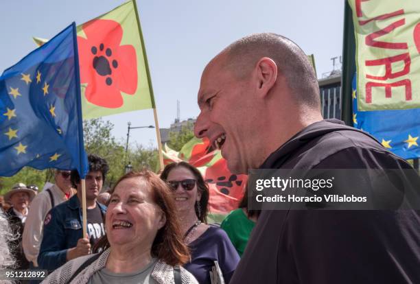 Former Greek Finance Minister and co-founder of DiEM25 Yanis Varoufakis poses for selfies with supporters before walking through Avenida da Liberdade...