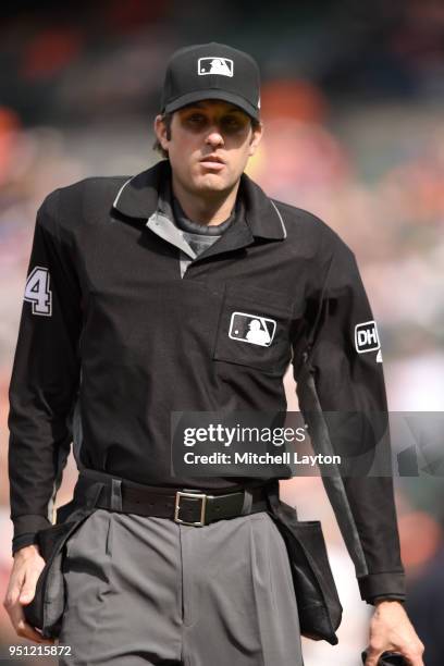Umpire John Tumpane looks on during a baseball game between the Baltimore Orioles and the Cleveland Indians at Oriole Park at Camden Yards on April...