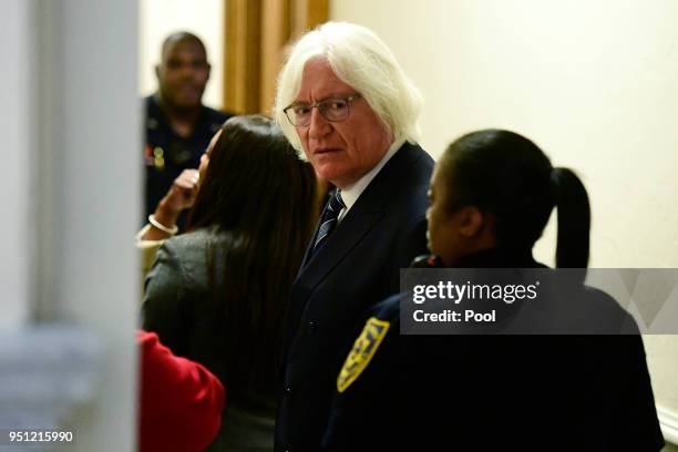 Tom Mesereau, center, lawyer for actor and comedian Bill Cosby, talks outside a private room during a break in Cosby's sexual assault trial at the...