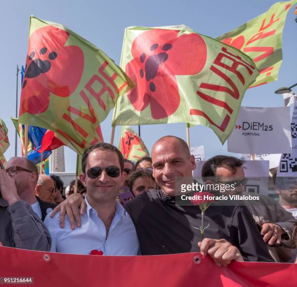 Former Greek Finance Minister Yanis Varoufakis and former French Socialist Party member and founder of Génération-s Benoit Hamon before walking...