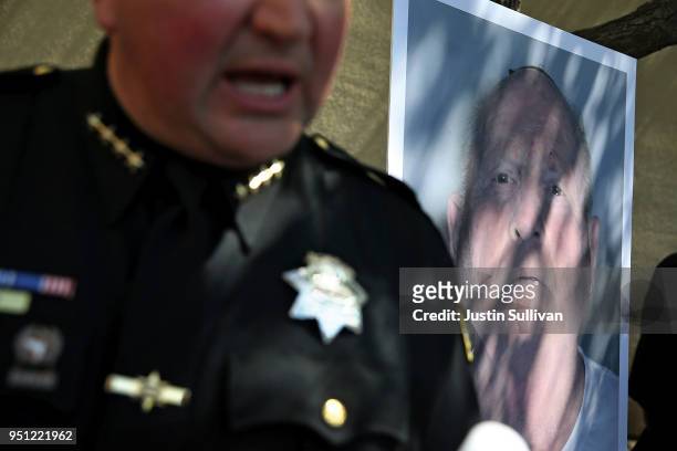Photo of accused rapist and killer Joseph James DeAngelo is displayed during a news conference on April 24, 2018 in Sacramento, California....
