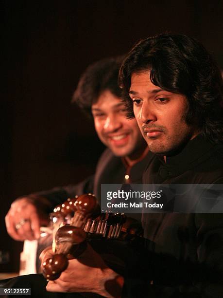 Sarod players Amaan and Ayaan Ali Khan at the launch of the book 50 Maestros 50 Recordings in New Delhi on Monday, December 21, 2009.
