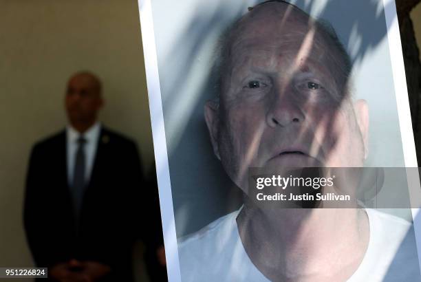 Photo of accused rapist and killer Joseph James DeAngelo is displayed during a news conference on April 25, 2018 in Sacramento, California....