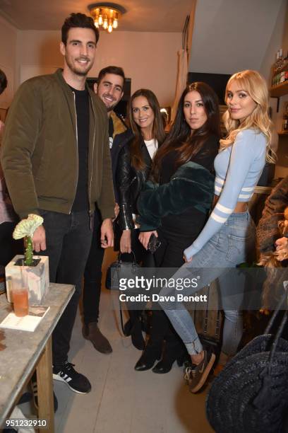 Steven Finn, Stevie Eskinazi, guest, Sahar Zamadian and Emma Rose attend the Taylor Morris summer pop-up launch party in Notting Hill on April 25,...