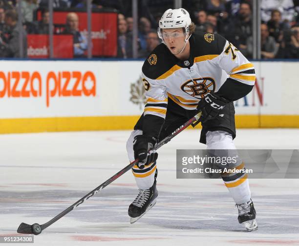 Charlie McAvoy of the Boston Bruins skates with the puck against the Toronto Maple Leafs in Game Six of the Eastern Conference First Round in the...