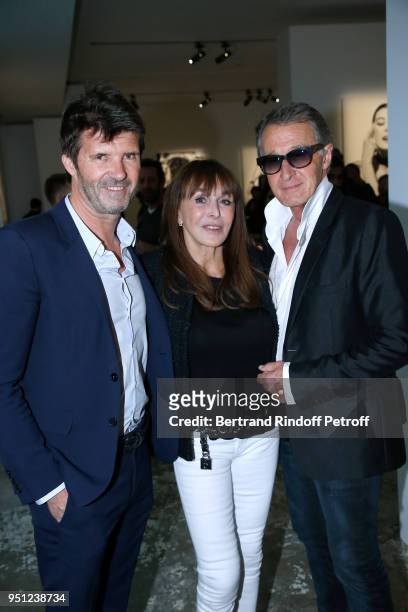 Of Mazarine Group Paul-Emmanuel Reiffers, Creator of the 'Numero magazine' Babeth Djian and Eric Pfrunder attend the Cocktail Party for the...