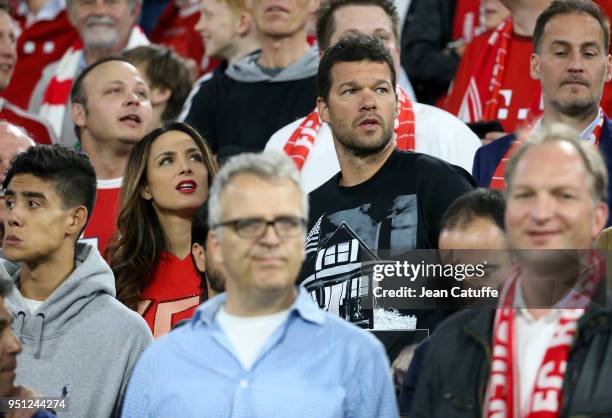 Michael Ballack and Natacha Tannous attend the UEFA Champions League Semi Final first leg match between Bayern Muenchen and Real Madrid at the...