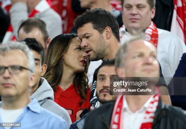 Michael Ballack and Natacha Tannous attend the UEFA Champions League Semi Final first leg match between Bayern Muenchen and Real Madrid at the...