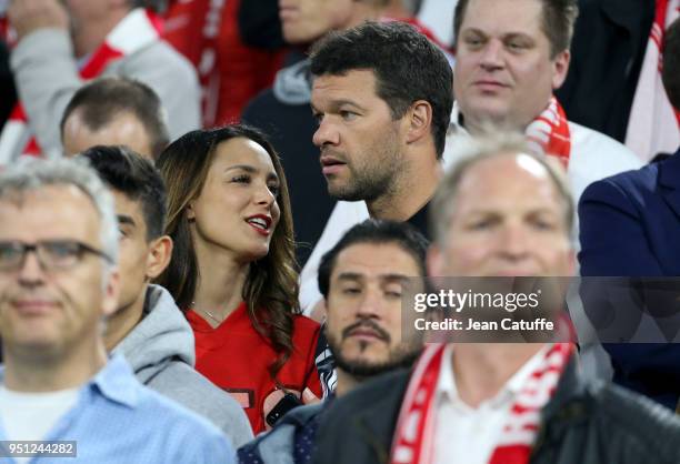 Michael Ballack and Natacha Tannous attend the UEFA Champions League Semi Final first leg match between Bayern Muenchen and Real Madrid at the...