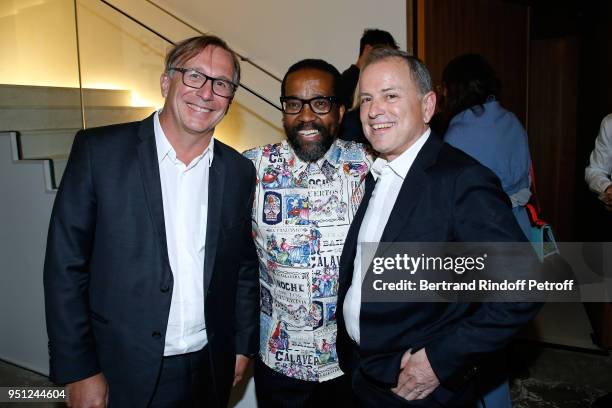 President of Fashion Activities at Chanel Bruno Pavlovsky, Photographer Koto Bolofo and CEO of Louis Vuitton Michael Burke attend the Cocktail Party...