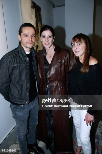 Stylist Olivier Theyskens, Choreographer Marie-Agnes Gillot and Creator of the 'Numero magazine' Babeth Djian attend the Cocktail Party for the...