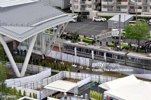 People offer flowers at an altar on April 25, 2018 in Amagasaki, Hyogo, Japan. The worst train accident in 40 years killed 107 people and injured...