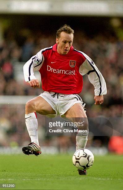Lee Dixon of Arsenal controls the ball during the FA Carling Premiership match against Chelsea played at Highbury, in London. The match ended in a...