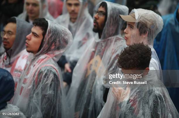 Fan takes a moment of silence for the victims of the Toronto van attack in Jurassic Park, the Raptors tailgate event outside as the Toronto Raptors...