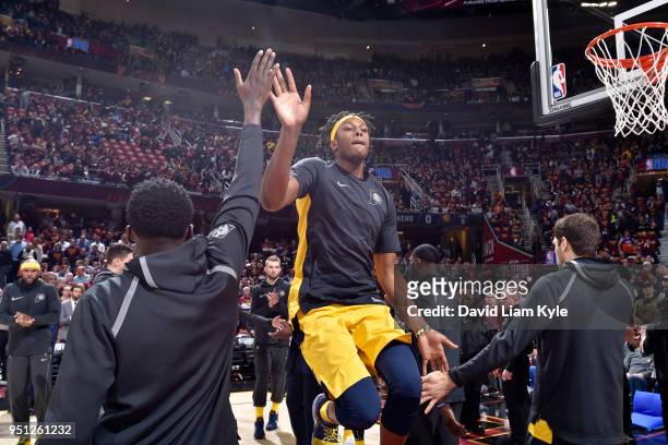 Myles Turner of the Indiana Pacers high-fives teammates as he enters the court before the game against the Cleveland Cavaliers in Game Five of Round...