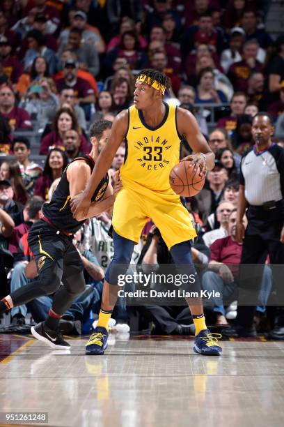 Myles Turner of the Indiana Pacers handles the ball against the Cleveland Cavaliers in Game Five of Round One of the 2018 NBA Playoffs between the...