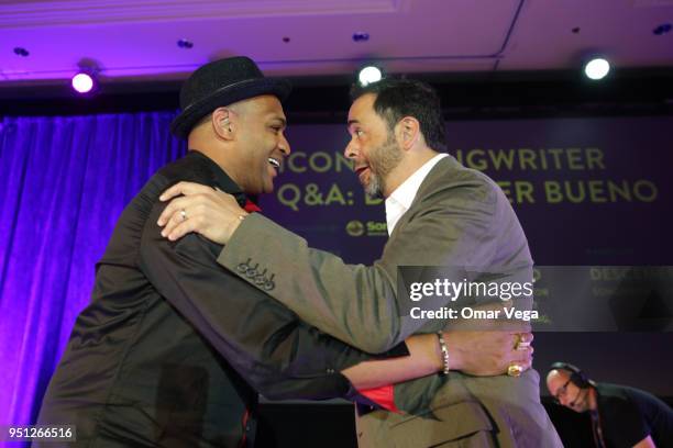 Songwriter, Descemer Bueno greets Jorge Mejia during the Iconic Songwriters conference as part of the Billboard Latin Music Week at The Venetian on...