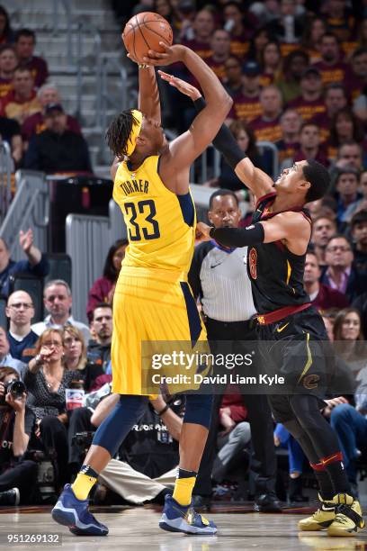 Myles Turner of the Indiana Pacers shoots the ball over Jordan Clarkson of the Cleveland Cavaliers in Game Five of Round One of the 2018 NBA Playoffs...