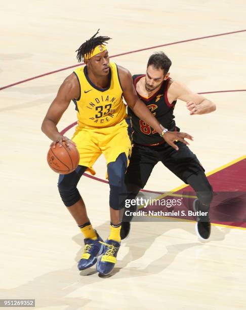 Myles Turner of the Indiana Pacers handles the ball against the Cleveland Cavaliers in Game Five of Round One of the 2018 NBA Playoffs on April 25,...