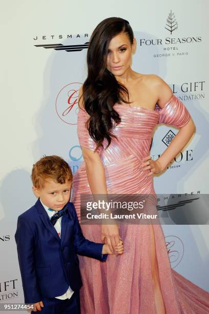 Caterina Lopez and his son attend "Global Gift Gala Paris 2018 at Four Seasons Hotel George V on April 25, 2018 in Paris, France.