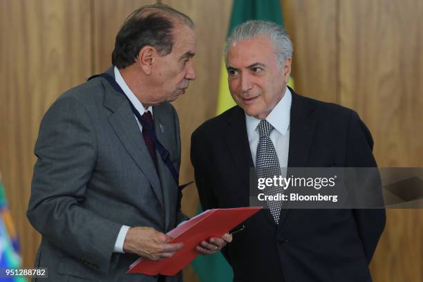 Michel Temer, Brazil's president, right, speaks with Aloysio Nunes Ferreira, Brazil's foreign minister, during a ceremony of accreditation at the...