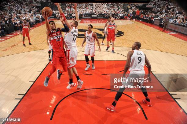 Otto Porter Jr. #22 of the Washington Wizards goes to the basket against the Toronto Raptors in Game Five of the Eastern Conference Quarterfinals...