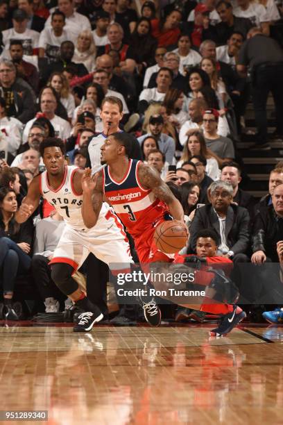 Bradley Beal of the Washington Wizards handles the ball against the Toronto Raptors in Game Five of the Eastern Conference Quarterfinals during the...