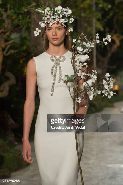 Model walks the runway for Reem Acra new collection during Barcelona Bridal Fashion Week at Les Drassanes on April 25, 2018 in Barcelona, Spain.