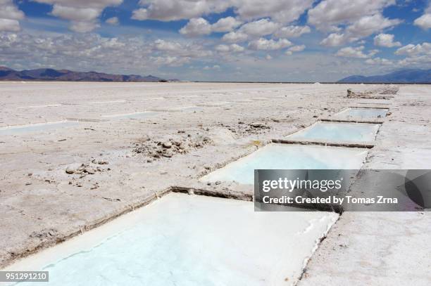 salt flats of salinas grandes used for drying salt - salinas grandes stockfoto's en -beelden