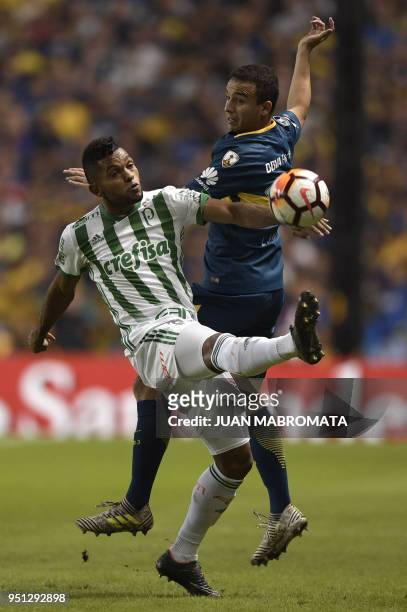 Brazil's Palmeiras forward Miguel Borja vies for the ball with Argentina's Boca Juniors defender Leonardo Jara during their Copa Libertadores 2018...