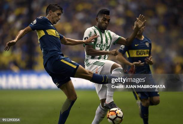 Brazil's Palmeiras forward Miguel Borja vies for the ball with Argentina's Boca Juniors defender Santiago Vergini during their Copa Libertadores 2018...