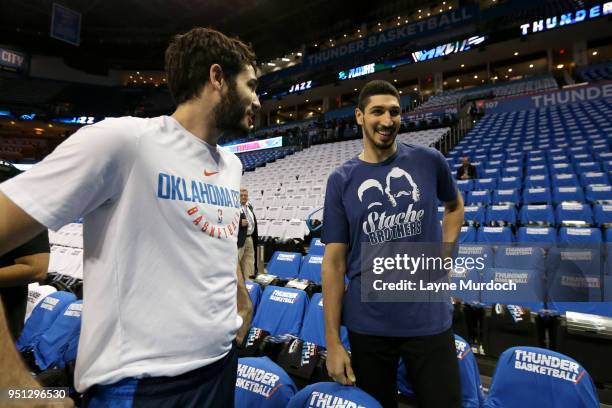 Alex Abrines of the Oklahoma City Thunder and Enes Kanter of the New York Knicks talk before the game against the Utah Jazz in Game Five of Round One...