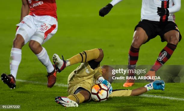 Colombia's Independiente Santa Fe goalkeeper Robinson Zapata grabs the ball during their Copa Libertadores football match against Brazil's Flamengo...