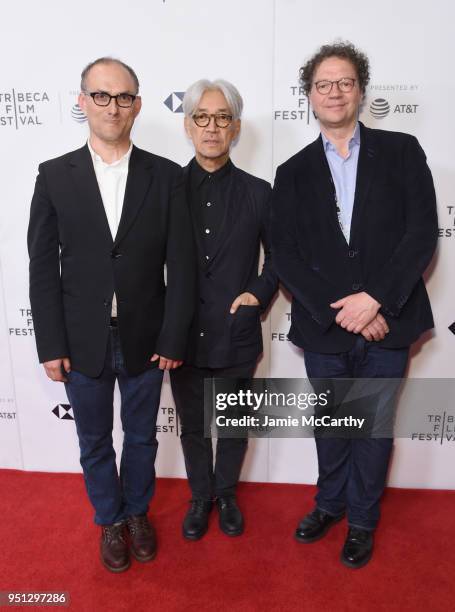Stephen Nomura Schible and Ryuichi Sakamoto and Frederic Boyer attend the screening of "Ryuichi Sakamoto: Coda" during the 2018 Tribeca Film Festival...