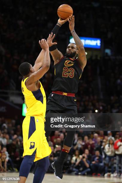 LeBron James of the Cleveland Cavaliers hits the game winning shot over Thaddeus Young of the Indiana Pacers to win Game Five of the Eastern...
